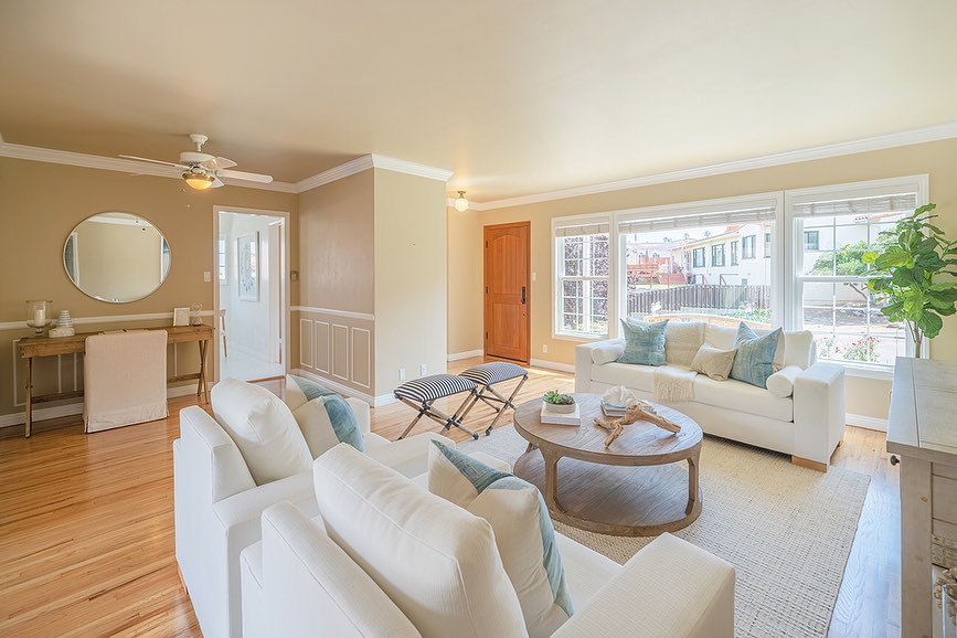 Go to the link in our bio for a virtual tour of this beautiful home! The spacious front porch welcomes you home and invites you to stay outside to enjoy a beautifully landscaped yard, an intimate conversation with family, morning coffee, or a mid-afternoon sun break. As you enter, a warm, family room is the central focus of this home with large sliding glass doors leading to a private outdoor area, perfect for dining, relaxing, and entertaining. The home frames the back yard in an L shape, giving the yard a courtyard feel. Hidden in the back of the yard awaits a cedar hot sauna. The main family area leads directly to an office space, kitchen, and formal dining room with a peek-a-boo ocean view. Just off the kitchen, you will find a powder room, laundry area, and a back door to the yard. As you enter the upstairs master bedroom, you will be greeted with a soft sea breeze and a beautiful view of the ocean. The driveway leads to a two car, detached garage with a storage room. The long driveway allows for extra parking for family or guests. Hardwood floors on the lower level have been refinished. Bathrooms updated and kitchen freshly painted. Asking $1,599,000.