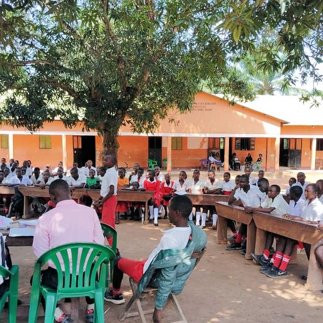 2024 photos from St Timothy's School, Nzara, South Sudan. Including photos of the students' outdoor debate about the relative merits of girls' versus boys' education. They decided that education of girls was the most important!