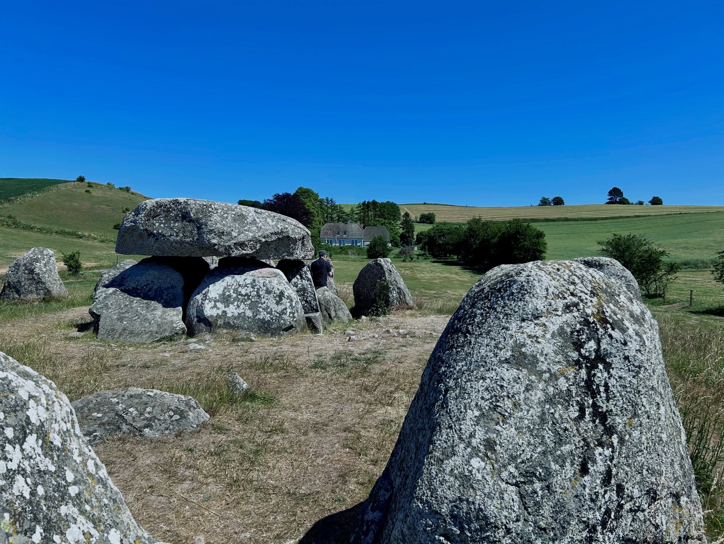 Exploring granite boulder barrows from the Stone Age in Denmark and vintage shopping in the picturesque town of Ebeltoft. 🇩🇰 #europeansummer