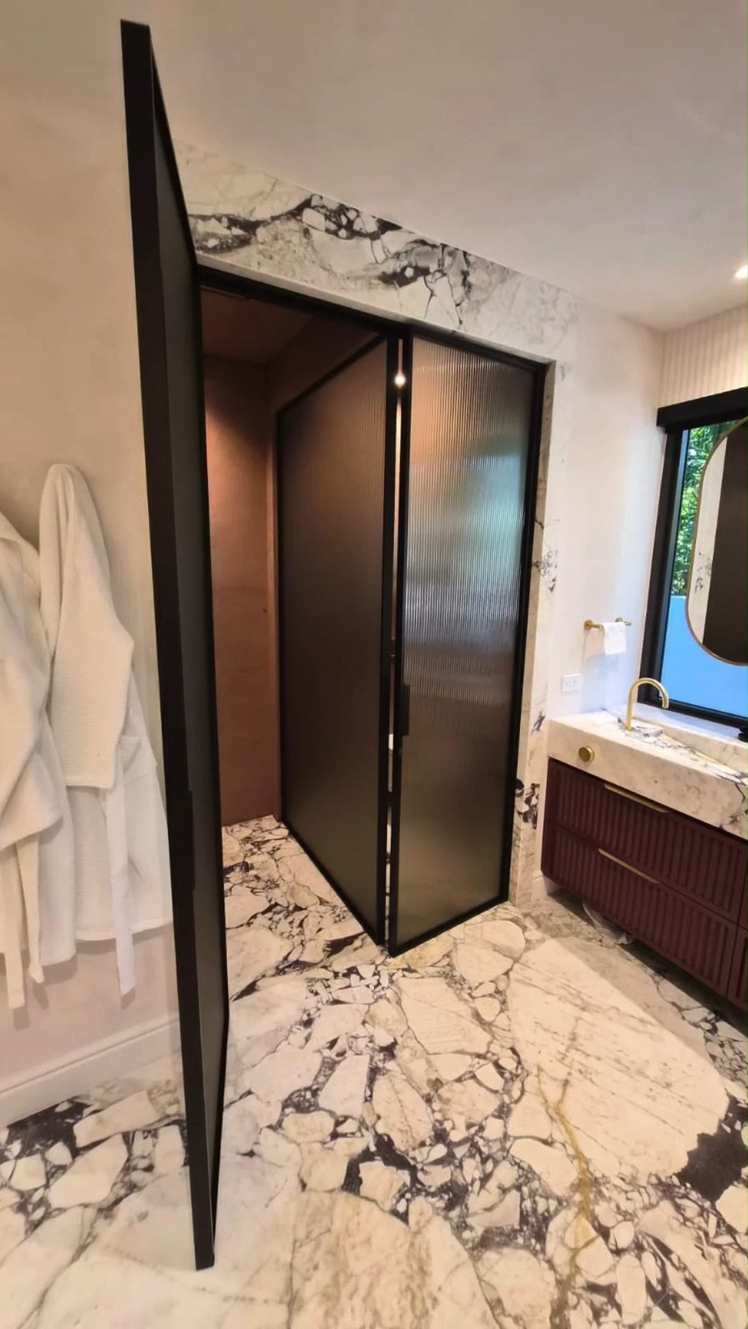 Luxury is in the details.
Custom bronze fluted glass and bronze frame.
Project by @europeancabinets
#InteriorDesign #InteriorDesigner #InteriorArchitecture #Architect #LuxuryInteriors #BathroomDesign #LuxuryBathroom #FlutedGlass #BronzeFrame #CustomGlass #GlassDoors #ArchitecturalGlass #ItalianDesign #ModernInteriors #HighEndHomes